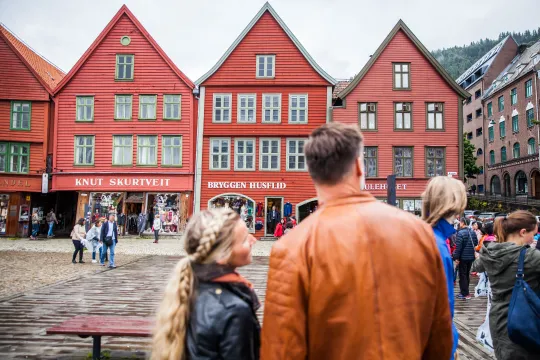 A couple enjoying Bryggen in Bergen