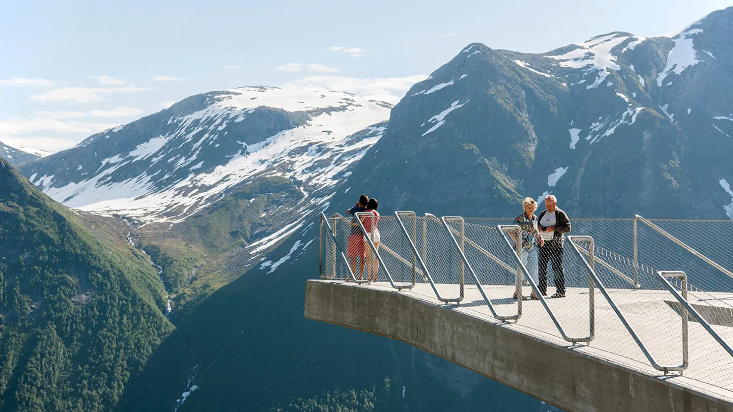 People enjoying the view from a viewpoint at the National Scenic Route Gaularfjellet