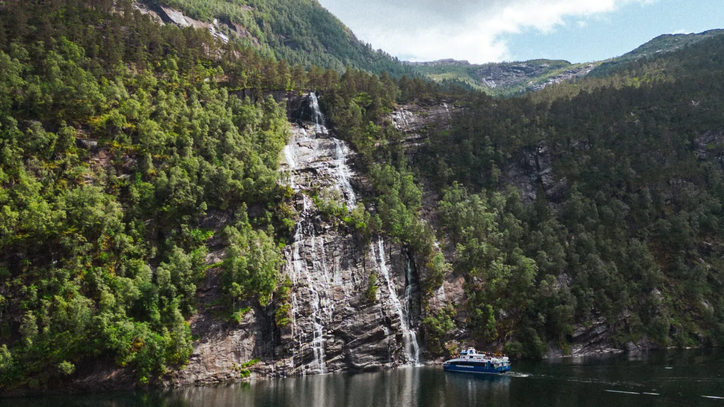 A fjord cruise admiring the magnificent waterfall in Modalen