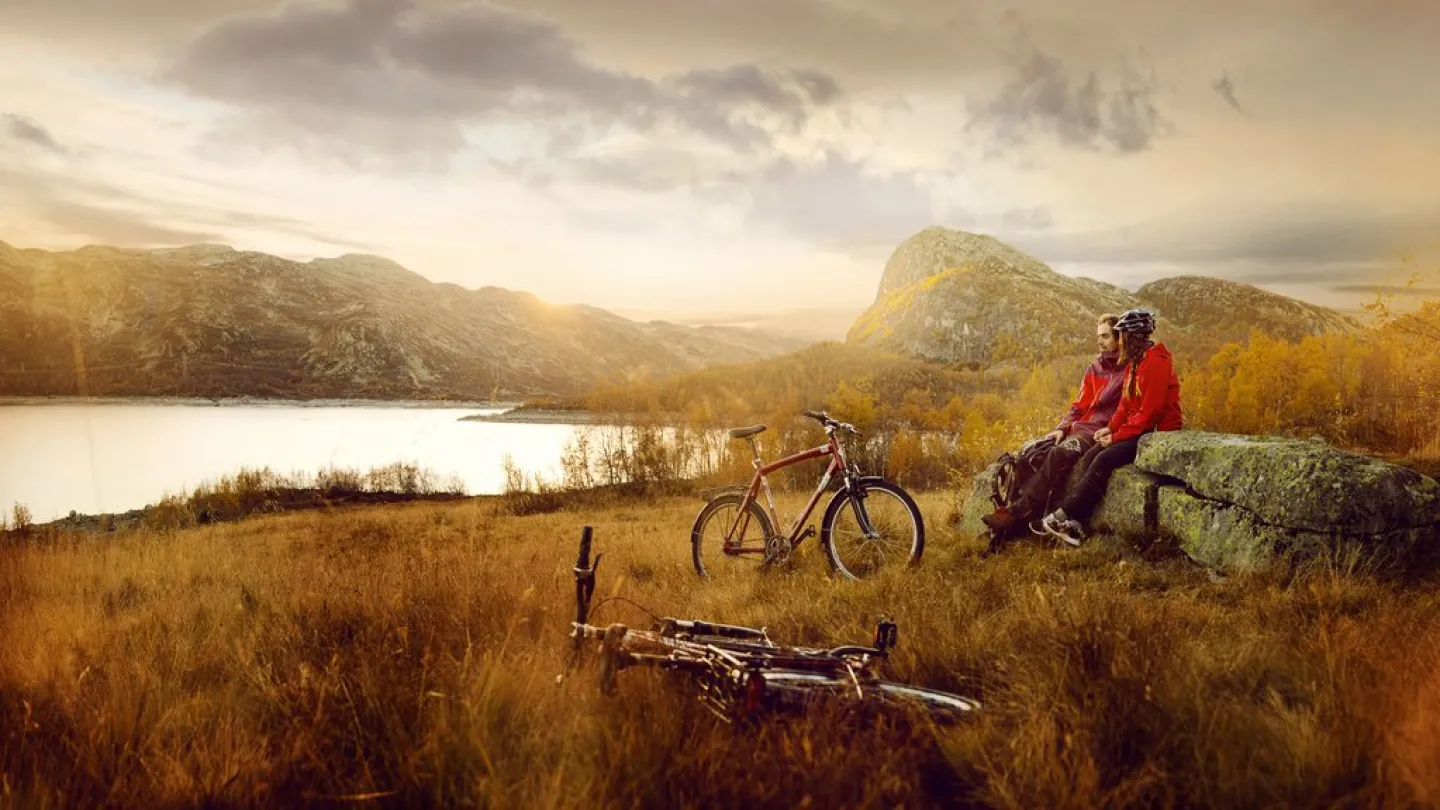 A couple enjoying the sunset in fall at Geilo