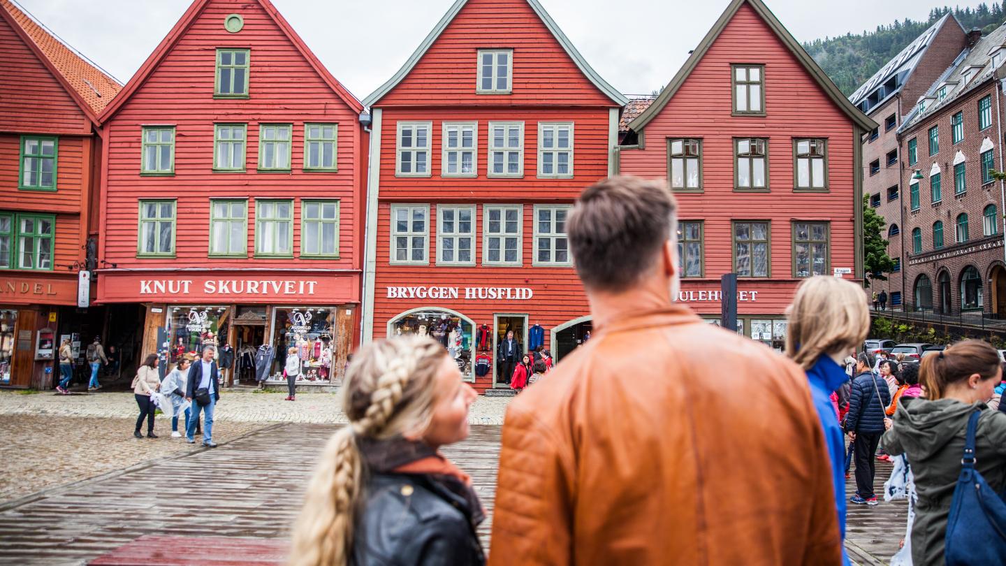 A couple enjoying Bryggen in Bergen