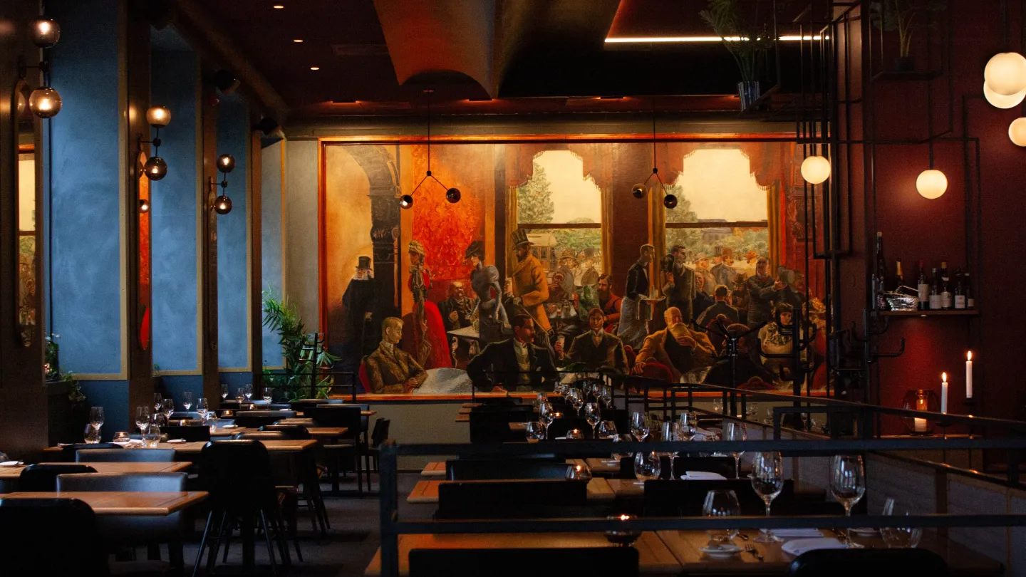 The interior of Grand Café focusing on the big painting