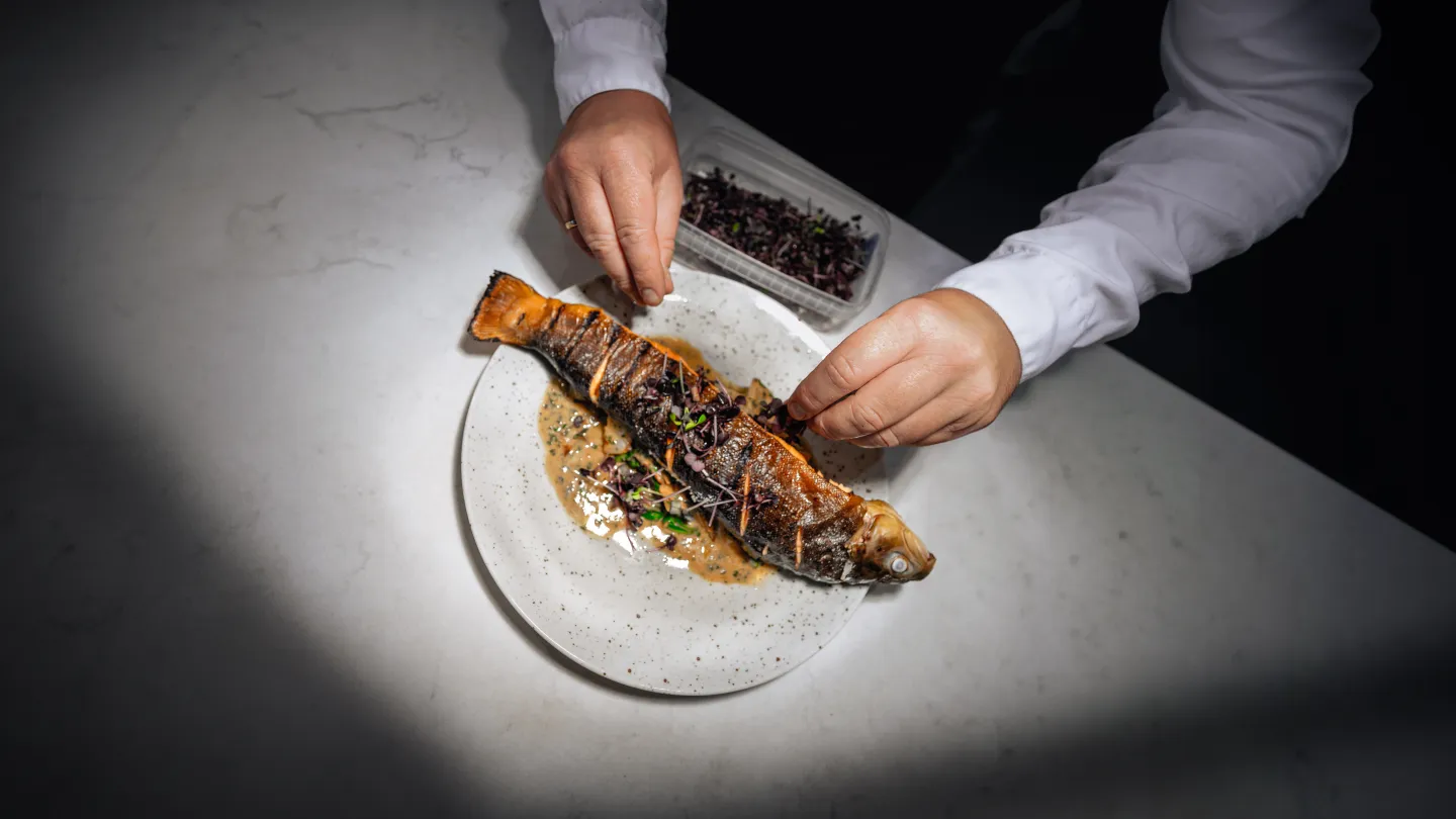 A dish being prepared at Grand Hotell Egersund