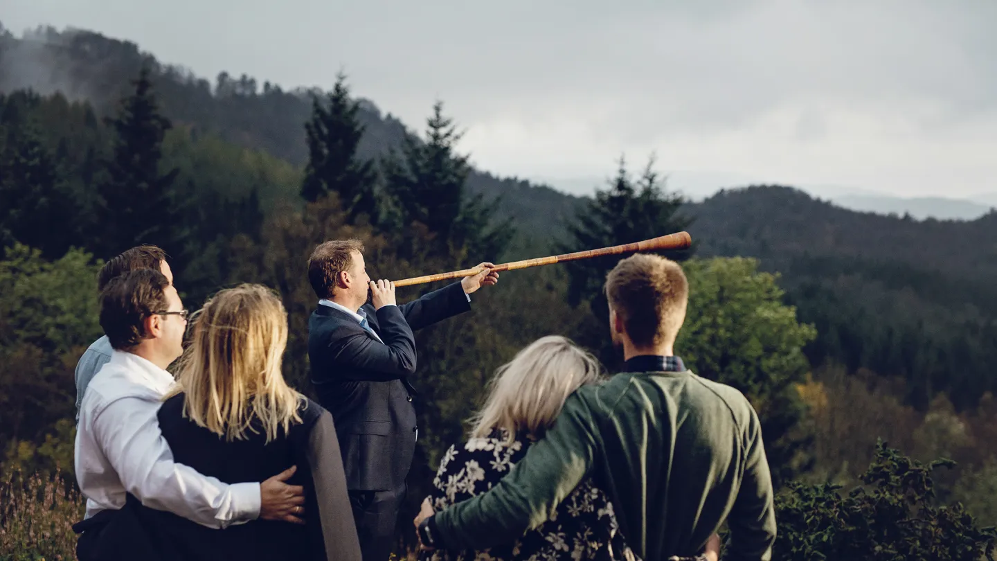 Torstein, the house father of Haaheim Gaard, entertaining his guests