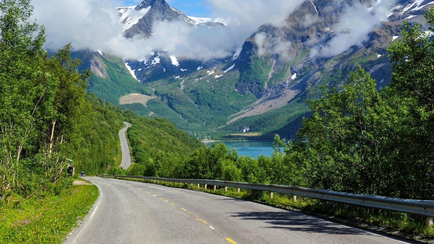 The Norwegian Scenic Route winding it's way through the landscape along the Helgeland Coast