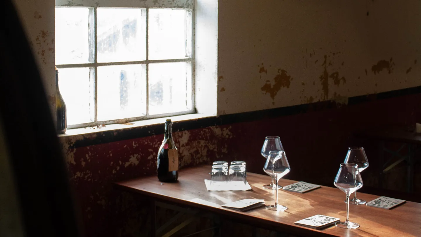 A table set for cider tasting inside at Aga Sideri