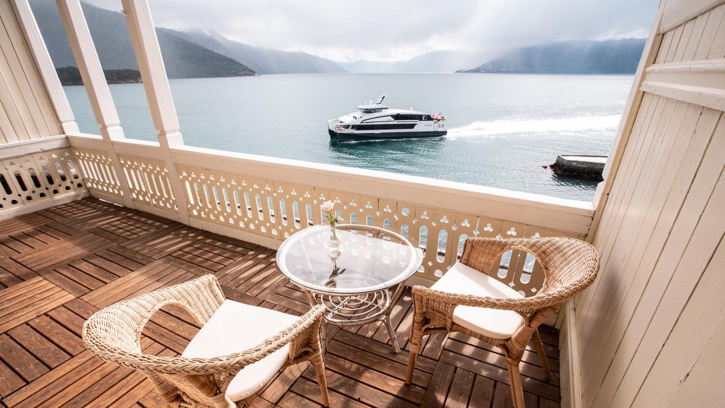 The view from one of the balconies at Kviknes Hotel overlooking the Sognefjord and an express boat