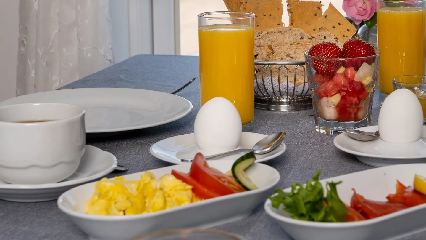 Breakfast served on the table at Lillesand Hotel Norge