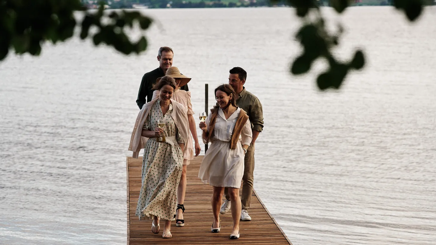 Guests enjoying the quay at Herregården Hoel